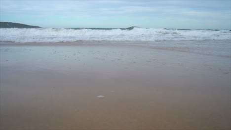 wave-come-and-wash-out-shooting-from-low-angle