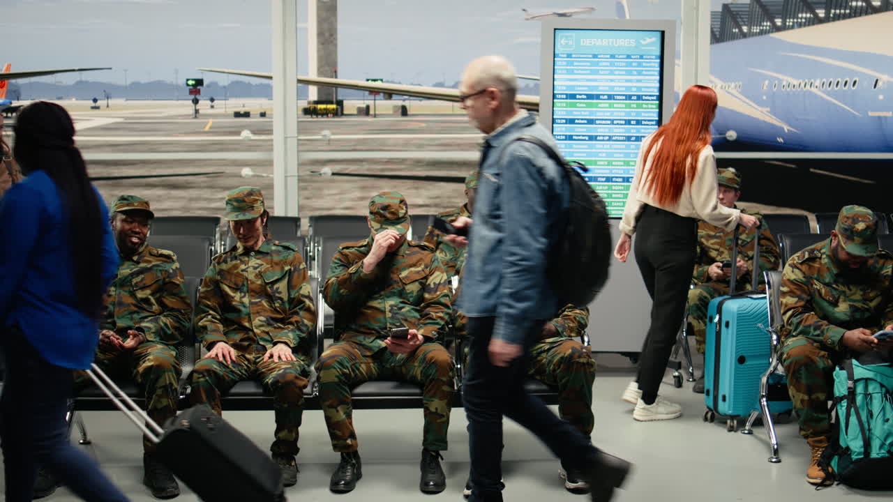 Waiting, plane arrival and happy military team in busy airport