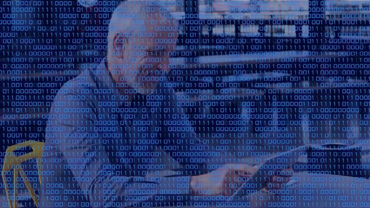 Animation of data processing over caucasian businessman using tablet