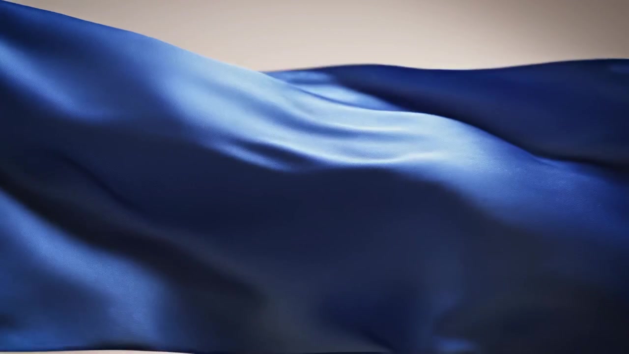Tessuto di seta blu che ondeggia al vento
