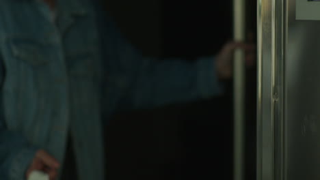 person entering a doorway