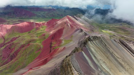 Aerial-fly-drone-view-of-Rainbow-Mountain-,-Vinicunca,-Cusco-Region,-Peru