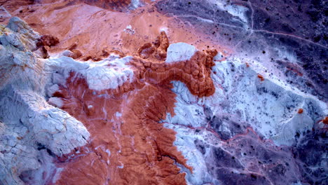 Rugged cliffs and endless ridges stretch beneath the drone’s lens, a surreal vision of deep time.