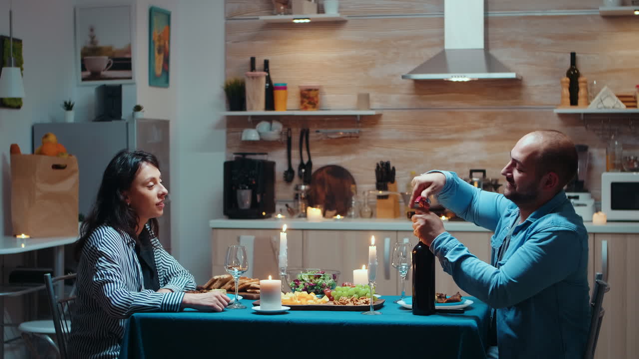 Man opening a bottle of wine