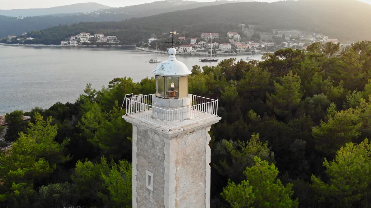 Beautiful White Venetian Lighthouse And Coastal Scenery Of Kefalonia Greece - aerial shot