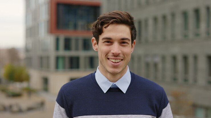 Smiling man portrait in urban setting