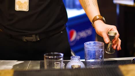 bartender skillfully prepares cocktails with precision