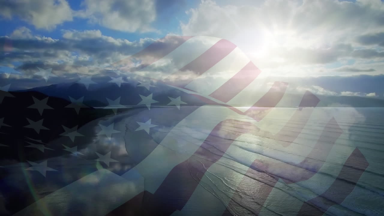 animación de la bandera de los estados unidos ondeando sobre el paisaje de la playa
