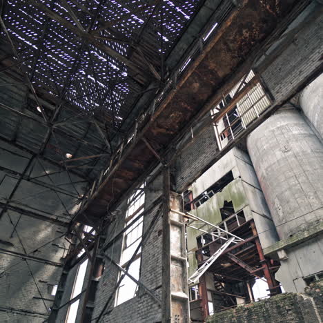 ruined and abandoned creepy industrial factory. old industrial building for demolition.