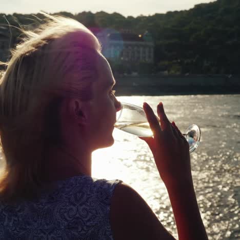 a woman with champagne on board the ship 1