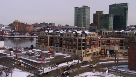 the cityscape and harbor of baltimore in winter 2