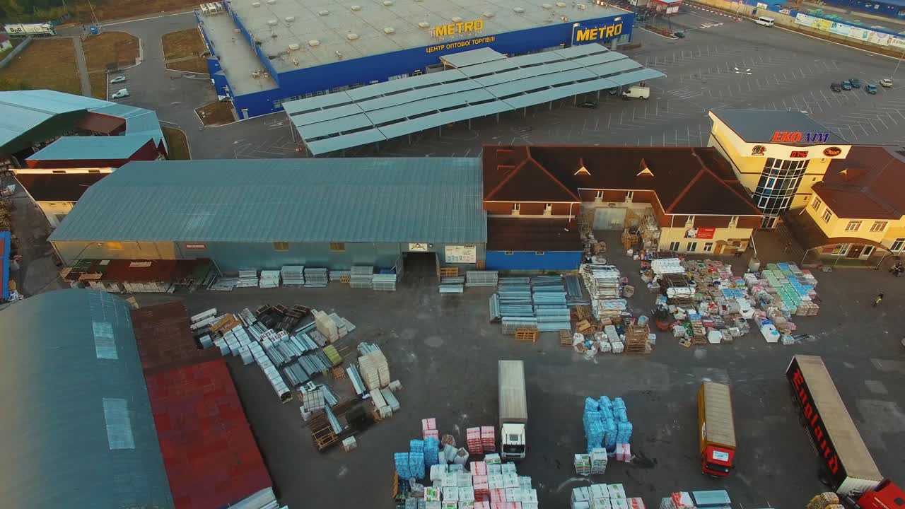 Building materials warehouse. Aerial view of large industrial logistic warehouse storage