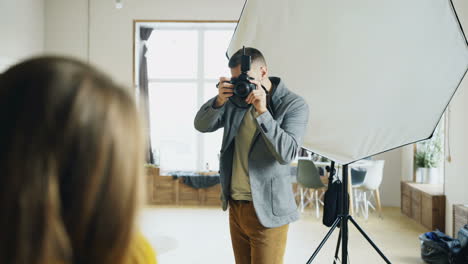 professional photographer taking pictures in a studio