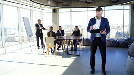 leader discussing work at meeting. corporate business team and manager at meeting