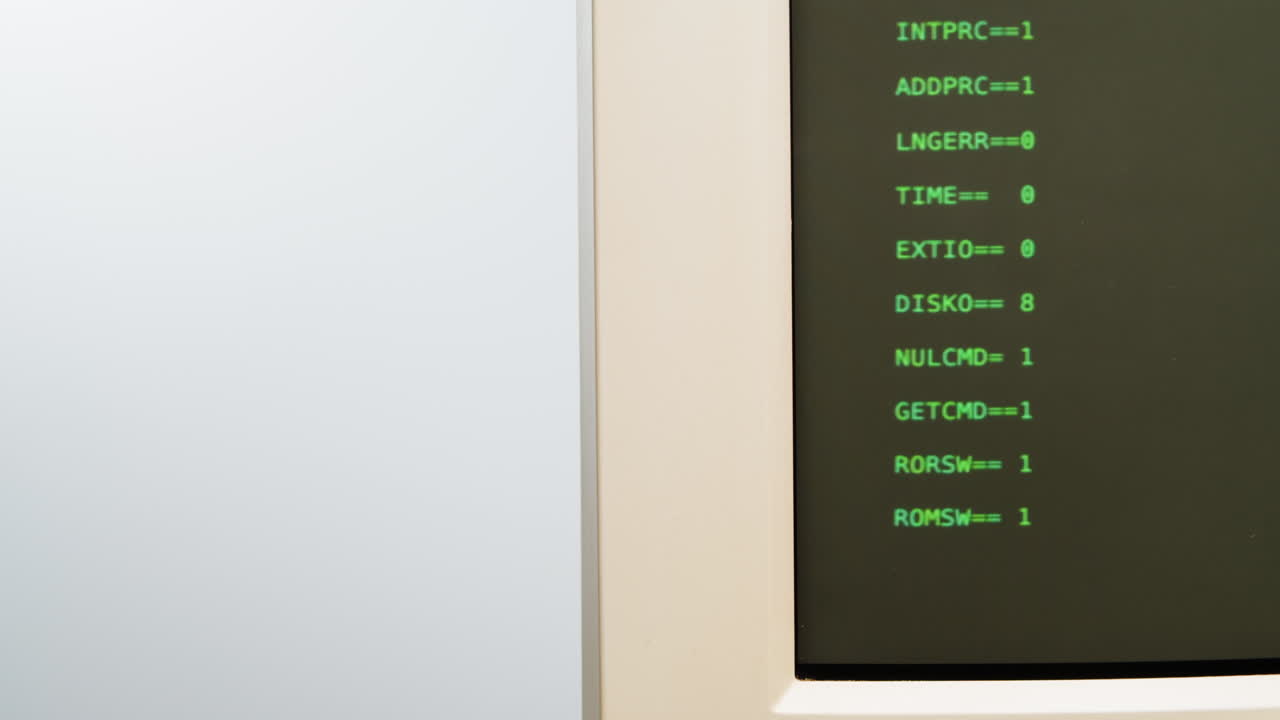 Vintage Computer Monitor Displaying Code