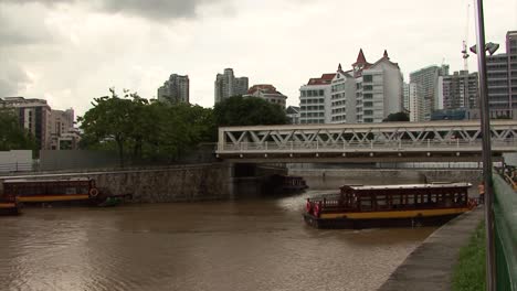 small boats on singapore river