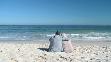 senior couple looking at the ocean