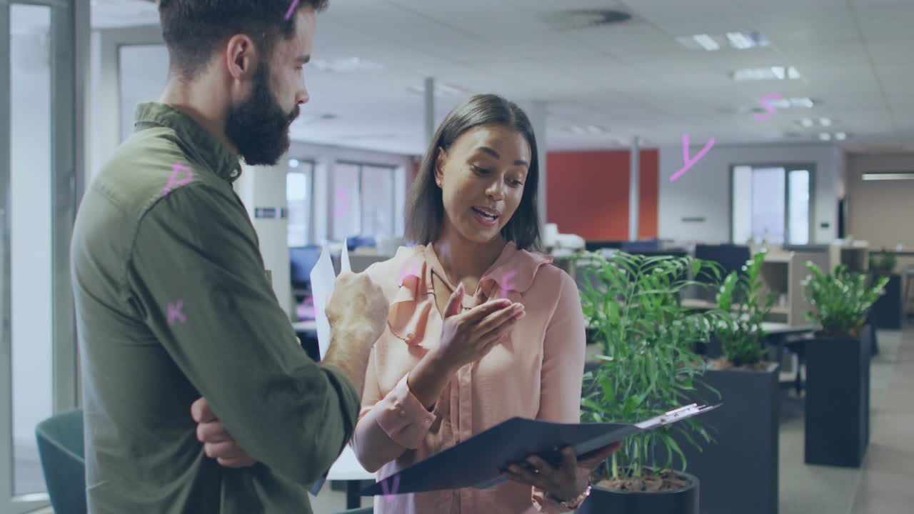Woman tilting black folder and pointing pages in office, clarifying project details for colleague