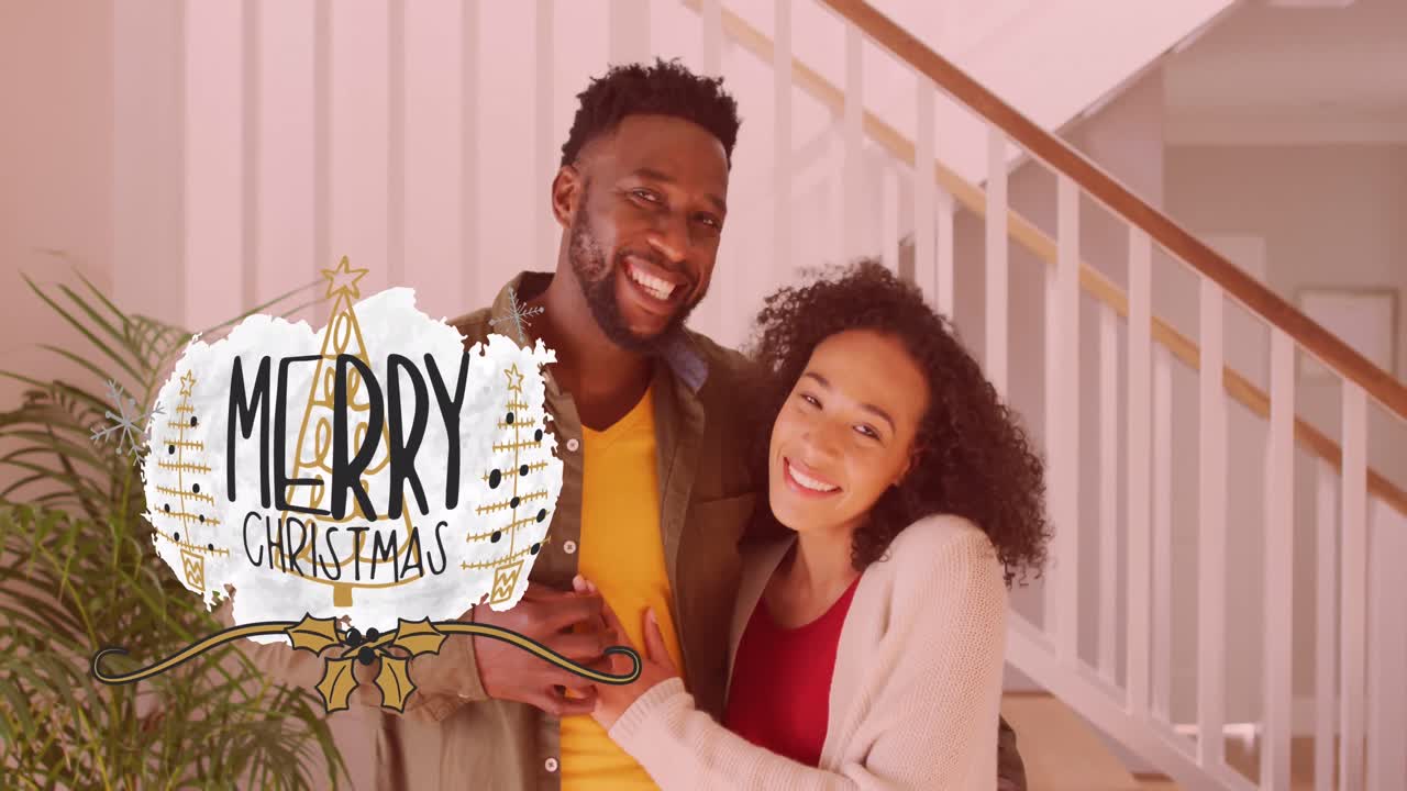 Animazione del testo "Buon Natale" su coppia afroamericana sorridente