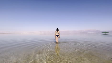 asian woman in the dead sea