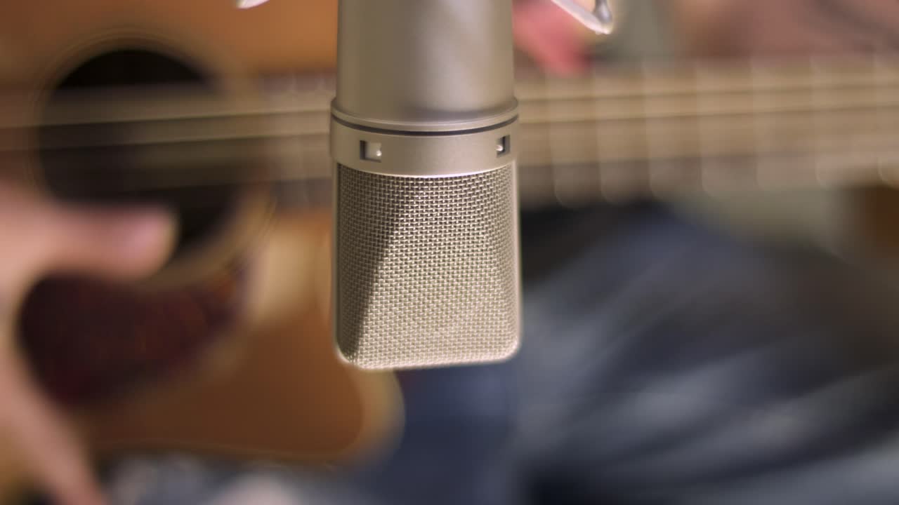 Microphone with Guitar in Background