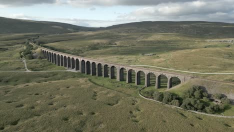 an aerial view of ribblehead viaduct in the yorhsire dales on a summer evening, england, uk