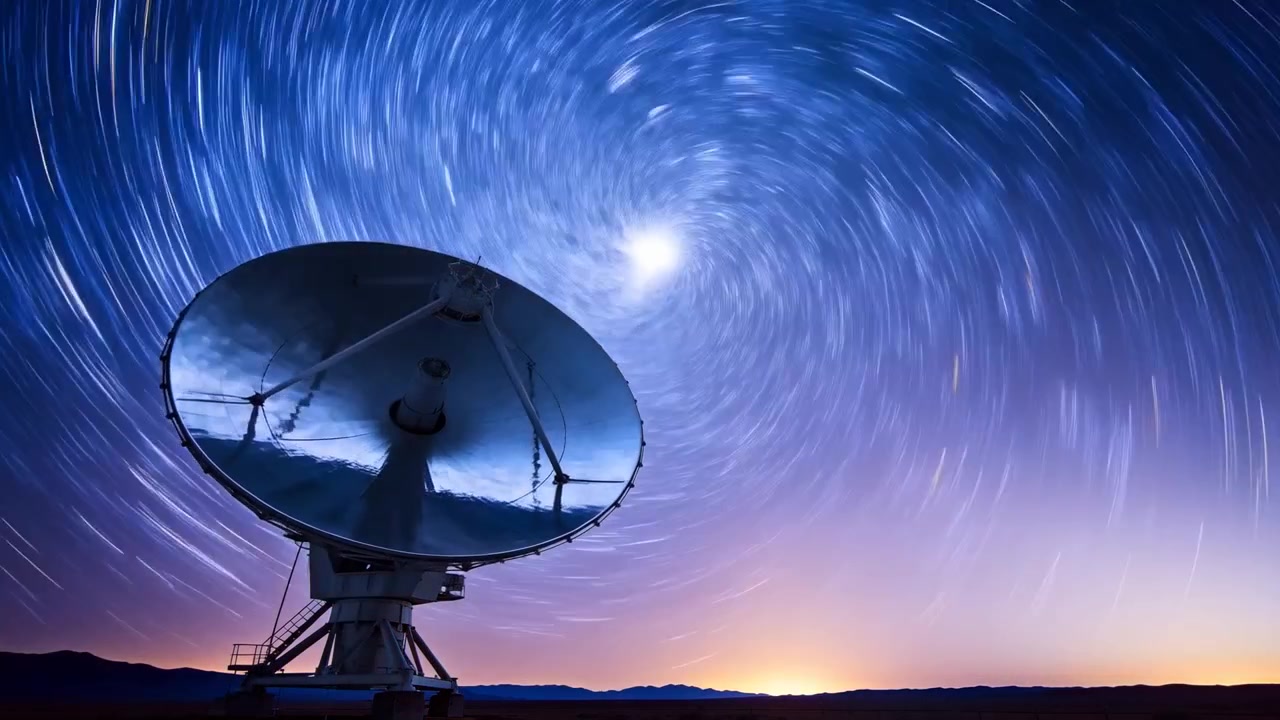 Tilting parabolic dish tracking bright object rising over desert plain, copy space
