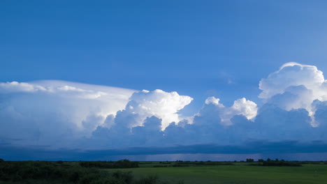 cumulonimbus storm clouds building on the horizon