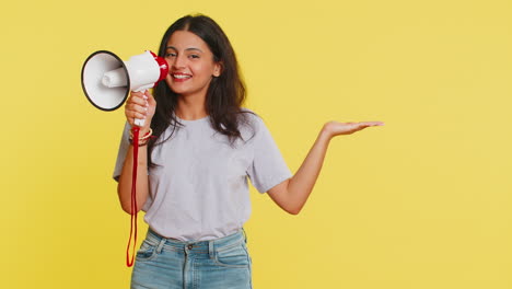 Indian-woman-talking-with-megaphone,-proclaiming-news-loudly-announcing-advertisement-discounts-sale