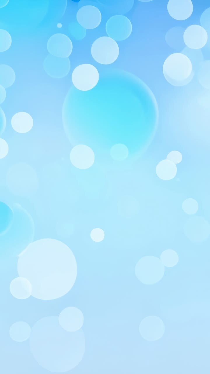 Vertical video: Looping animation drifting translucent white, teal circles across blue gradient