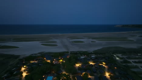 aerial view of a coastal camping resort at night