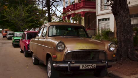 havana cuba september 2019 classic cuban cars line a residential street