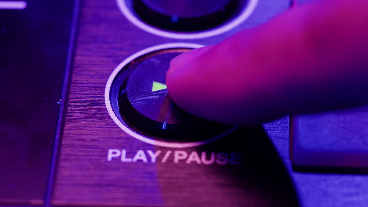 Vibrant DJ Mix Performance Closeup view of hands and equipment during a live music performance, city event, dj set in music techno club