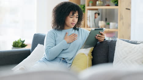 Sad young female on an video call on her tablet