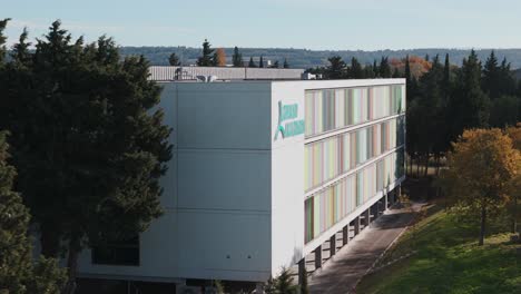 slow orbiting shot of a grand avignon office with colourful windows