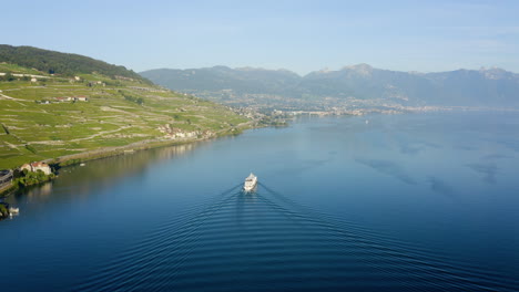 lausanne pleasure boat cruise at lake leman with scenic vineyard views near rivaz village in switzerland