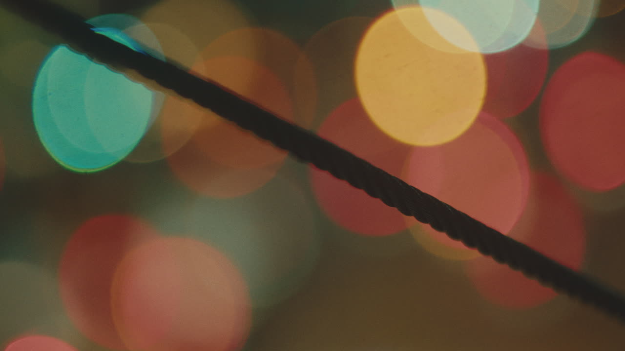 Blurred Background With Colorful Traffic Lights At Nighttime