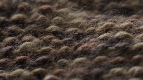 micro vídeo de primer plano de tela de lana de punto marrón con espacio para copiar