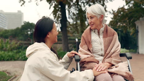 Wheelchair,-park-and-a-senior-woman