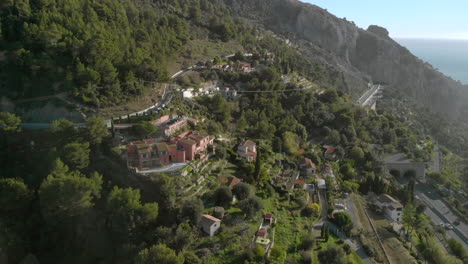 menton hillside villas on french riviera overlooking mediterranean coast, aerial