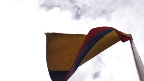 flag waving in wind in bogota colombia