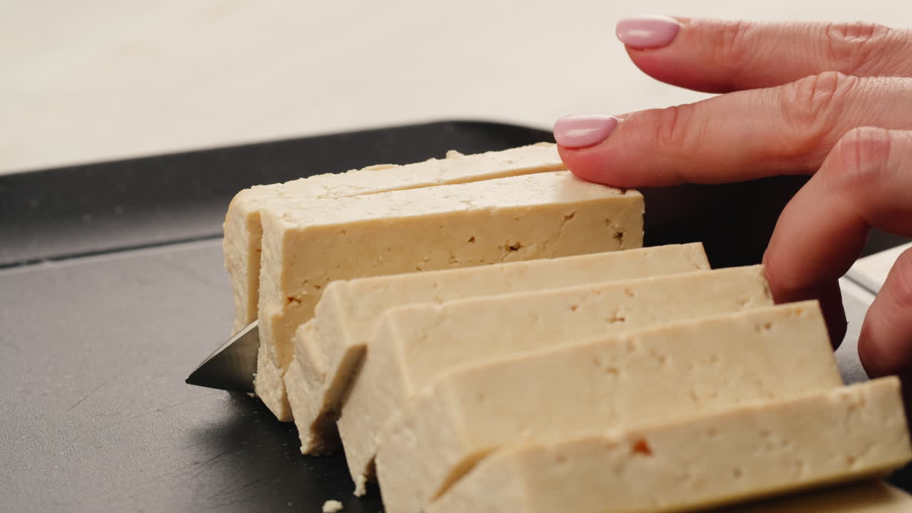 Slicing tofu with a knife