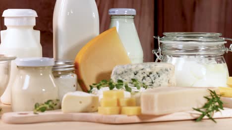 various dairy items displayed on wooden surface