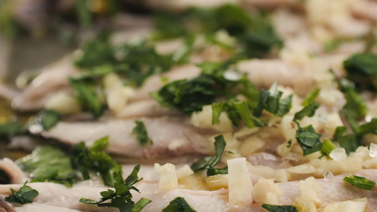 Fresh Sea sardines and Anchovy Fish and Mullus On Display On Ice On Market Store Shop. Seafood Fish Background, close up stand of small salty white fish.