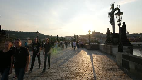 walking on charles bridge in the evening