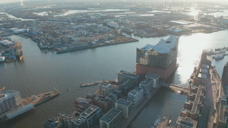 Aerial-view-of-Elbphilharmonie-concert-hall-building-on-the-river-bank-of-Elbe-river-in-Hamburg-city-center