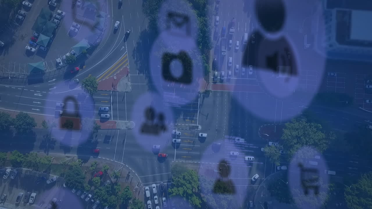 Animation of technology icons over road traffic