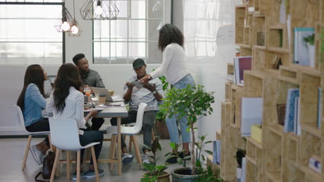 african-american-business-people-meeting-in-boardroom-pregnant-team-leader-woman-presenting-financial-graph-data-showing-colleagues-information-on-whiteboard-training-students-in-office-lecture