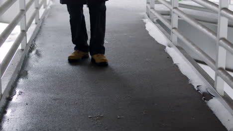 man walking alone outdoors