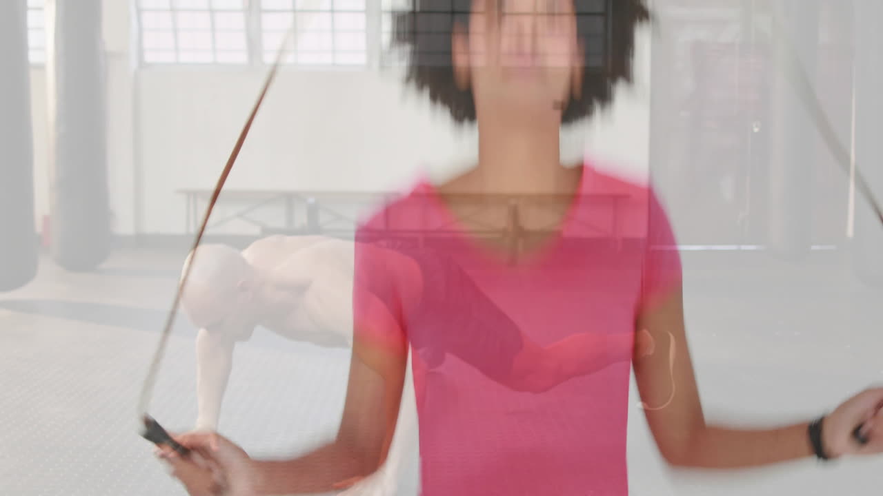 Jumping rope, person over another doing push-ups in gym with animation